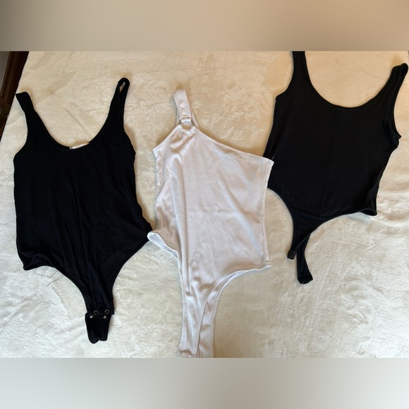 3 Bodysuits; 2 Black, 1 White - Picture 1 of 2